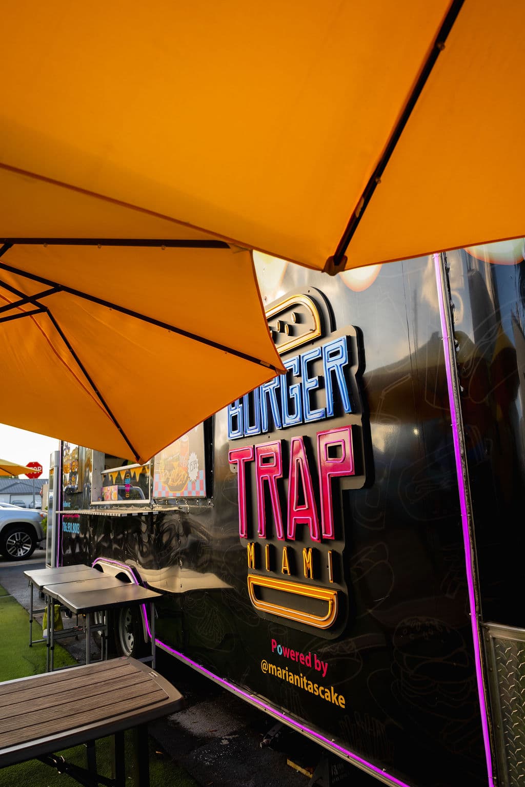 Burger Trap Miami neon sign near Hialeah Metrorail apartments